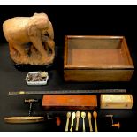 An oak bijouterie cabinet, 48cm x 36cm; a Stanley ruler case; a level; watch keys and winders; etc