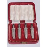 A set of four silver sweetcorn holders, the hafts as corn, 6.5cm long, cased, Birmingham 1960