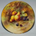 A Royal Worcester circular plate, painted by Price, signed, with pears and blackberries on a mossy