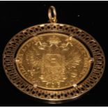 A 1915 Austrian 4 Ducat re-strike gold coin, 4cm in diameter, pierced circular mount and