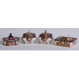 A pair of Royal Crown Derby Imari square bombe shaped boxes and covers, 8cm wide, printed marks;