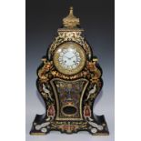A large 19th century French gilt metal mounted Boulle and ebonised cartouche shaped mantel clock,