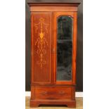 An Edwardian satinwood crossbanded mahogany and marquetry wardrobe, 201cm high, 99.5cm wide, 49.