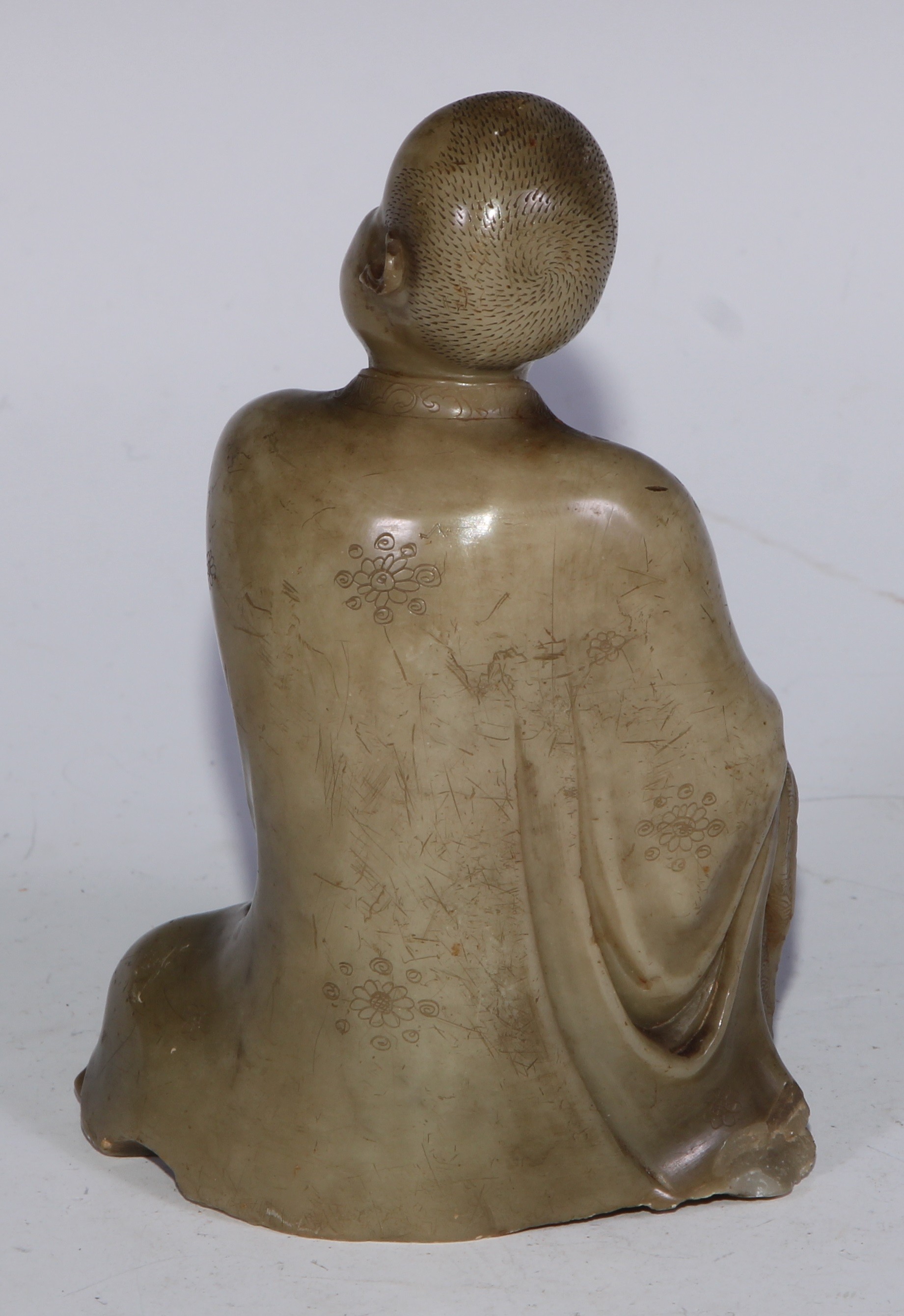 A Chinese soapstone figure, of a monk, seated, parting his robe, Buddha displayed on his chest, 12. - Bild 10 aus 11