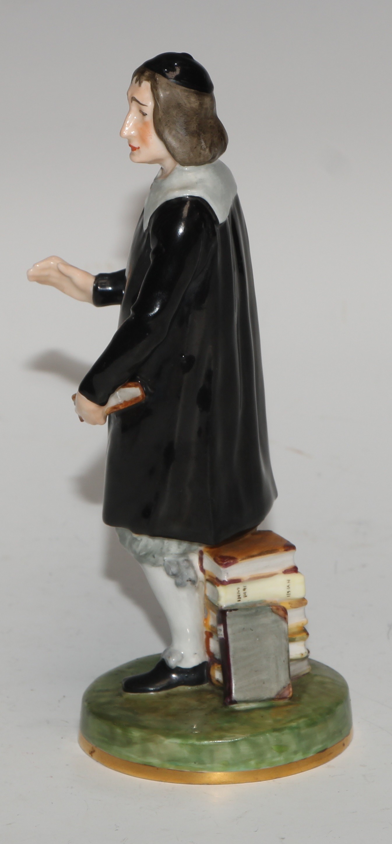 A Royal Crown Derby figure, San Grada, modelled with his books, 17cm high, printed mark - Image 2 of 5