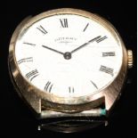 A Rotary 9ct gold cased dress watch head, white enamel oval dial, Roman numeral markers, manual
