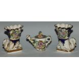 A pair of Bloor Derby cornucopia vases, encrusted with flowers and picked out in gilt on a cobalt