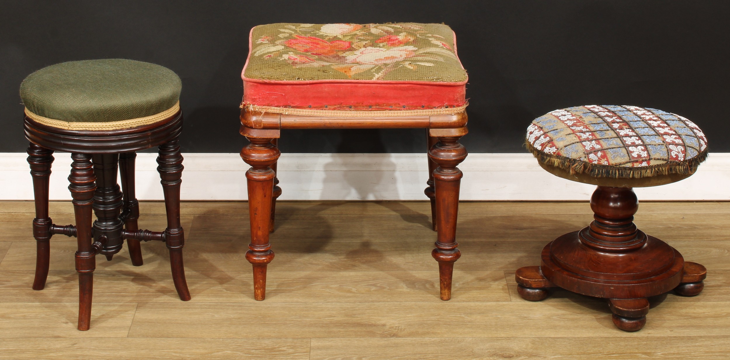 A Victorian mahogany circular stool, 38cm high, 37cm diameter; another, 48cm high, 32.5cm