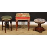 A Victorian mahogany circular stool, 38cm high, 37cm diameter; another, 48cm high, 32.5cm