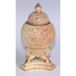 A Grainger & Co Worcester blush ivory ovoid reticulated pot pourri, outlined in gilt, incurved