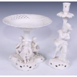 A Samson Hancock Derby figural candlesticks, Allegorical of Winter, in the white, 32cm high, S H