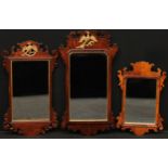 A George II Revival Vauxhall looking glass, bevelled mirror plate with reentrant upper angles,
