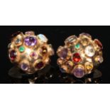 A pair of multi-gem clip on earrings, the domed body inset with oval and round cabochon and facet