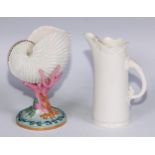 A Royal Worcester vase, naturalistically modelled as a nautilus shell upon a coral specimen, 16cm