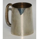 A George V silver spreading cylindrical mug, quite plain, gilt interior, 11.5cm high, Chester