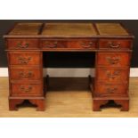 A George III style twin pedestal desk, 76.5cm high, 121cm wide, 61cm deep