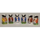 A Sampson Hancock Derby miniature toby jug, 4.5cm high, red mark; others, similar (6)