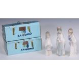 A Lladro figure, Boy with Crown, 21cm high, boxed; others (3)