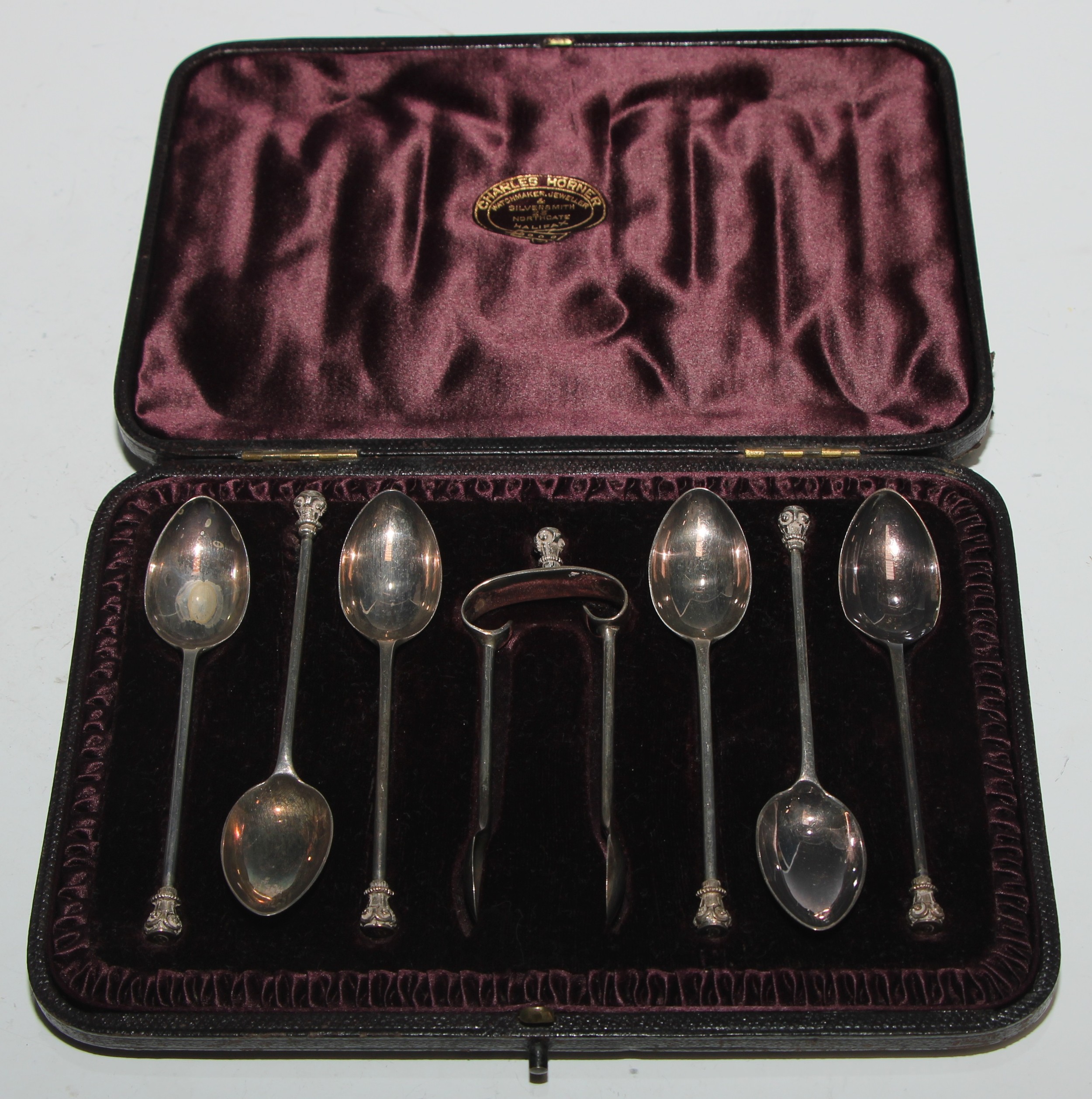 A set of six Victorian silver seal top teaspoons, sugar tongs en suite, retailed by Charles - Image 2 of 4