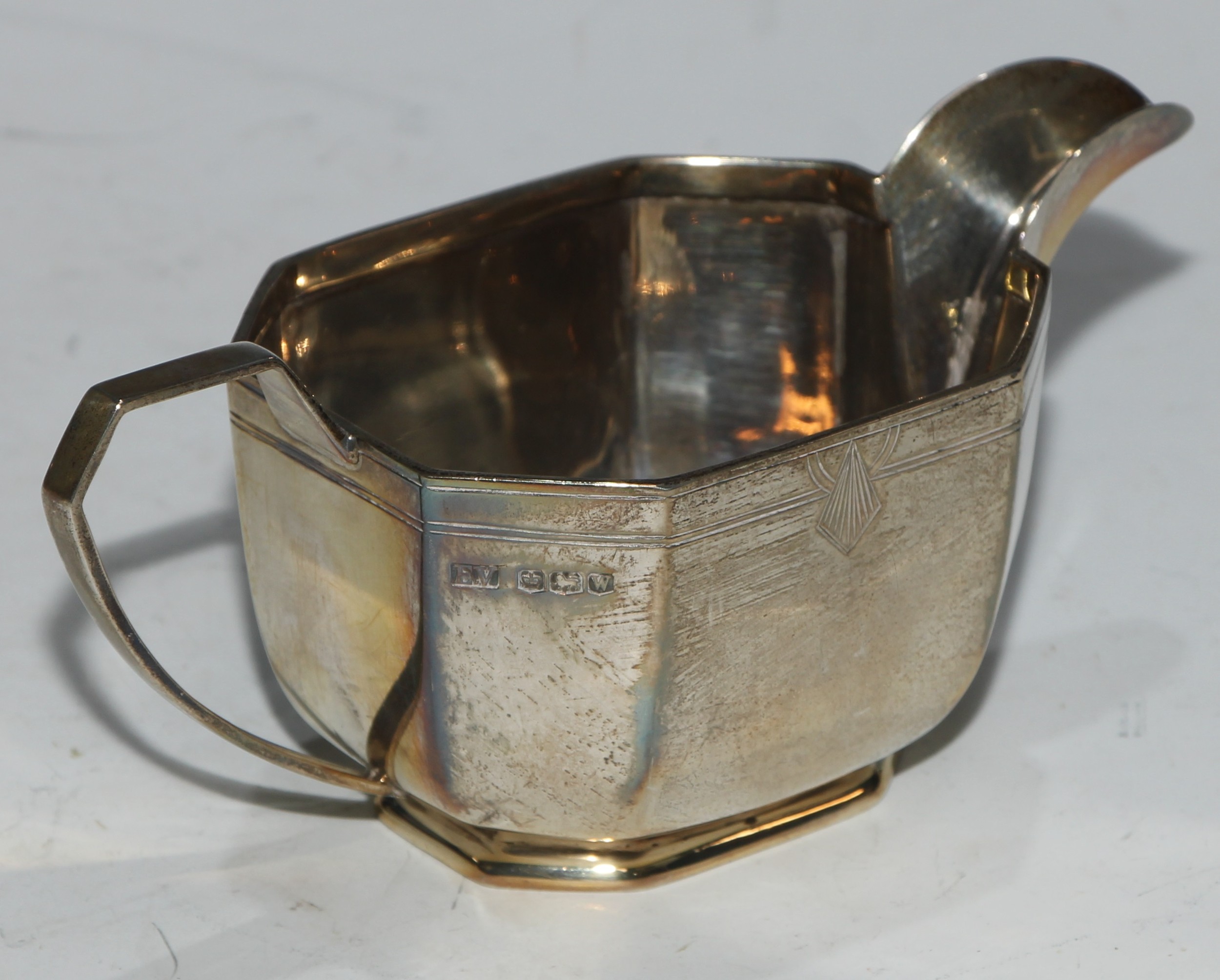 A late Art Deco silver four-piece tea service, Viners Ltd - Edward Viner, Sheffield, 1939, 1572g - Image 7 of 9