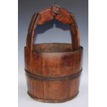 A coopered larch well bucket, 55cm high, 33.5cm diameter