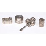 An Edwardian silver hexagonal pill box, the hinged cover embossed with a basket of flowers, the