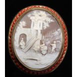 A Victorian oval shell cameo brooch, carved with a continental genre scene, beaded coral border, 6cm