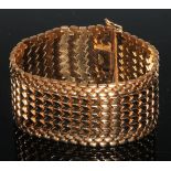 An 18ct gold Brevet articulated bracelet, formed from interlocked zigzag bands, 19cm long, 53g
