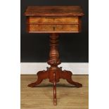 A 19th century walnut and mahogany work table, hinged top enclosing a sliding compartmented interior