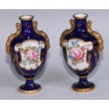 A matched pair of Royal Crown Derby ovoid vases, of French form, painted with reserves of