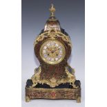 A 19th century French boulle cartouche shaped mantel clock, 10cm circular dial inscribed with