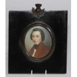 English School, early 19th century, an oval portrait miniature on ivory, young gentleman in brown