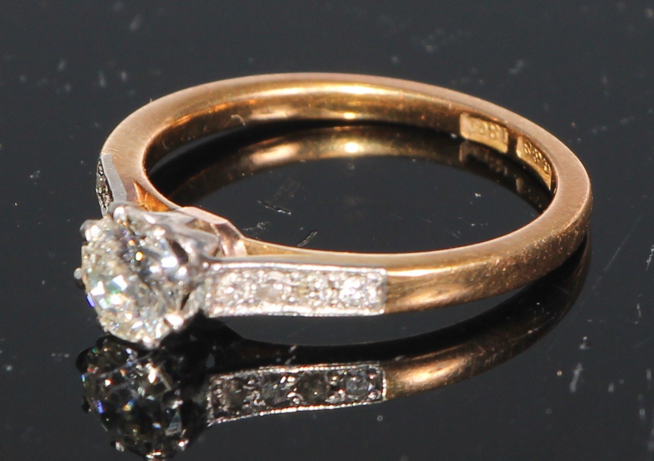 A diamond solitaire ring, set eight further diamonds to shoulders, 18ct yellow gold, size M/N - Image 2 of 2