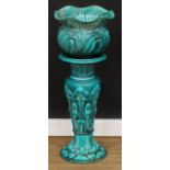 A Bretby Art Nouveau jardiniere and stand, turquoise glaze, 90cm high