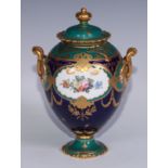 A Royal Crown Derby ovoid pedestal vase, decorated with summer flowers and gilded on a green and