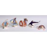 A Royal Crown Derby paperweight, Guppy, limited edition 591/2,500, gold stopper; another, Pacific