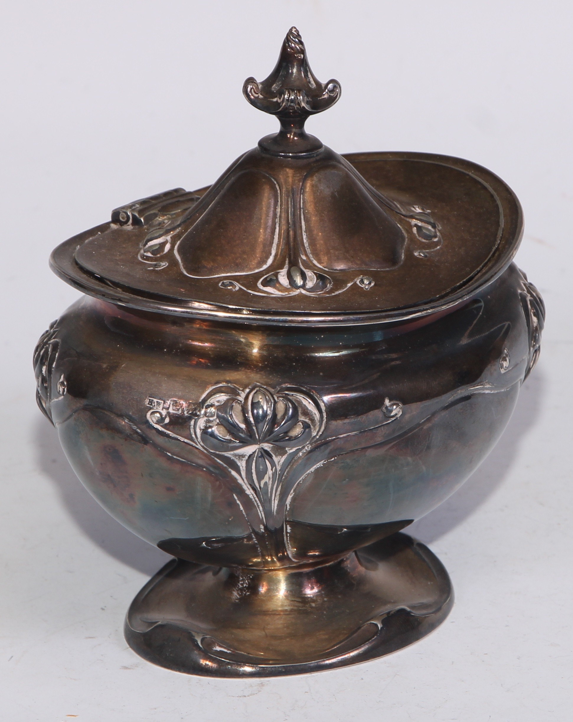 An Art Nouveau silver bombe shaped tea caddy, embossed with stylised flowers on whiplash stems, - Image 2 of 5