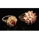 A large gold coloured metal flowerhead cluster ring, each petal divided by a small brilliant spinel,