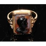 A hardstone cameo ring, the rectangular tablet carved with a bust of a centurion, 15ct beaded