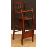 A late Victorian/Edwardian child’s combination high chair, stroller and rocking chair, 92.5cm