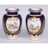 A pair of Royal Crown Derby ovoid vases, painted by W E J Dean, signed, with extensive landscapes,