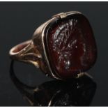 A late 19th/early 20th century carnelian intaglio ring, as a Roman Emperor possibly Julius Caesar in