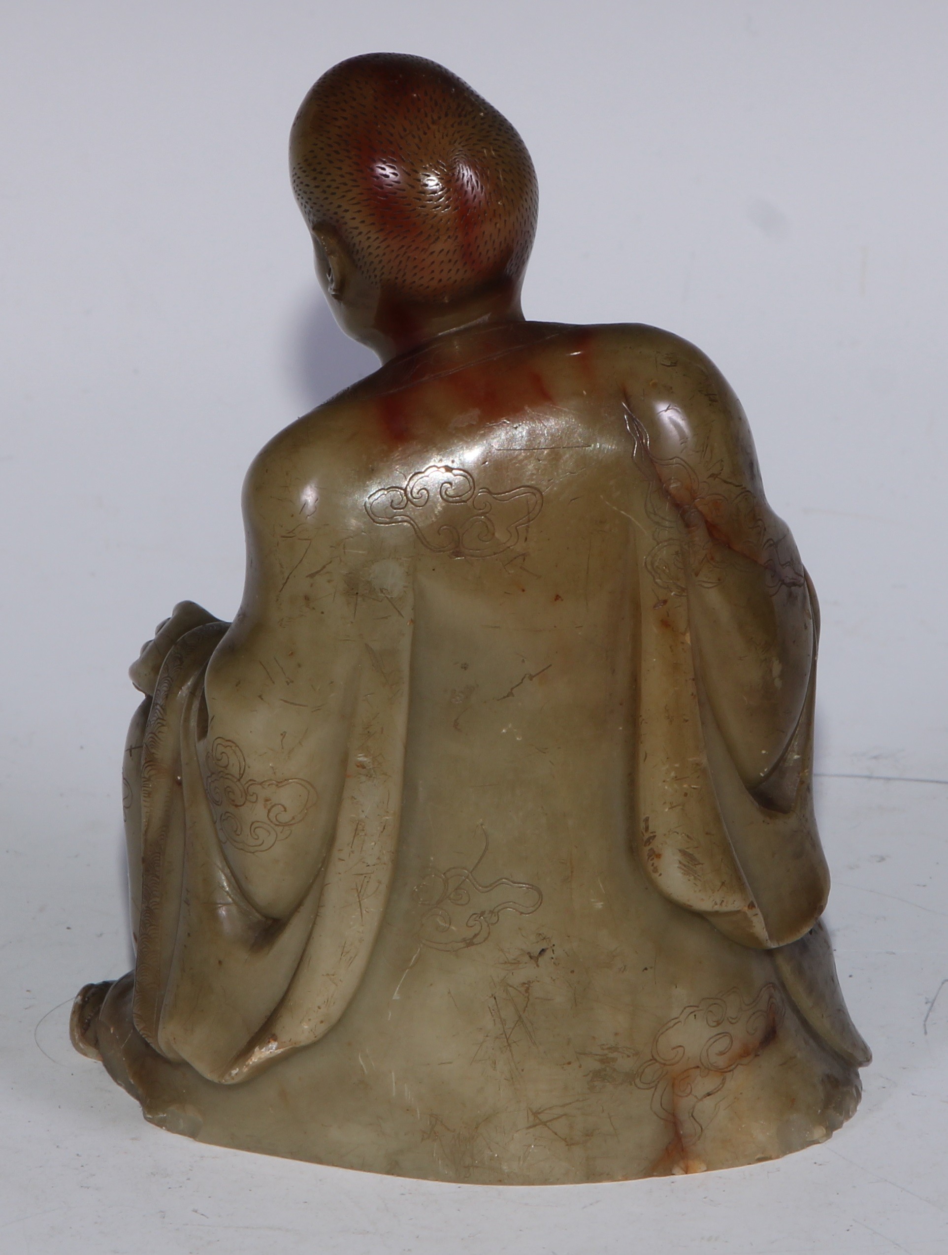 A Chinese soapstone figure, of a monk, seated, parting his robe, Buddha displayed on his chest, 12. - Bild 5 aus 11