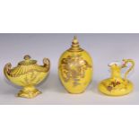 A Royal Crown Derby two-handled boat shaped pedestal vase, moulded and decorated in gilt on a yellow
