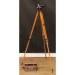 A theodolite, maker marked ER Watts & Son Ltd, serial no.49291, complete with leather case, tripod