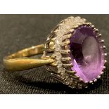 An 18ct gold amethyst and diamond ring, size P/Q, 6.5g