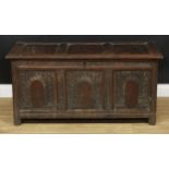 A 17th/early 18th century oak three panel blanket chest, 56cm high, 118cm wide, 53.5cm deep, c.1700