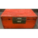 A Japanese red lacquered rectangular box and cover, bronzed metal drop handles, 43cm wide