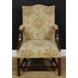 A George III Revival Gainsborough armchair, 90cm high, 59cm wide, the seat 48cm wide and 45cm deep