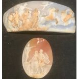 A 19th century curved rectangular shell cameo carved with Helios driving a chariot, accompanied by